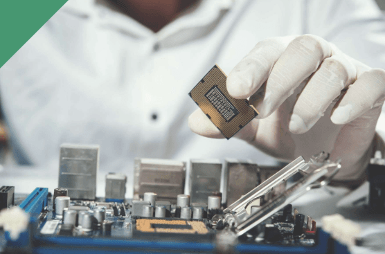 Technician handling electronic components for resale